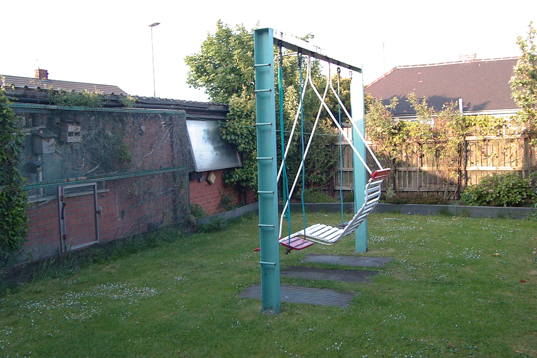 Back garden at Dovehouses with swings